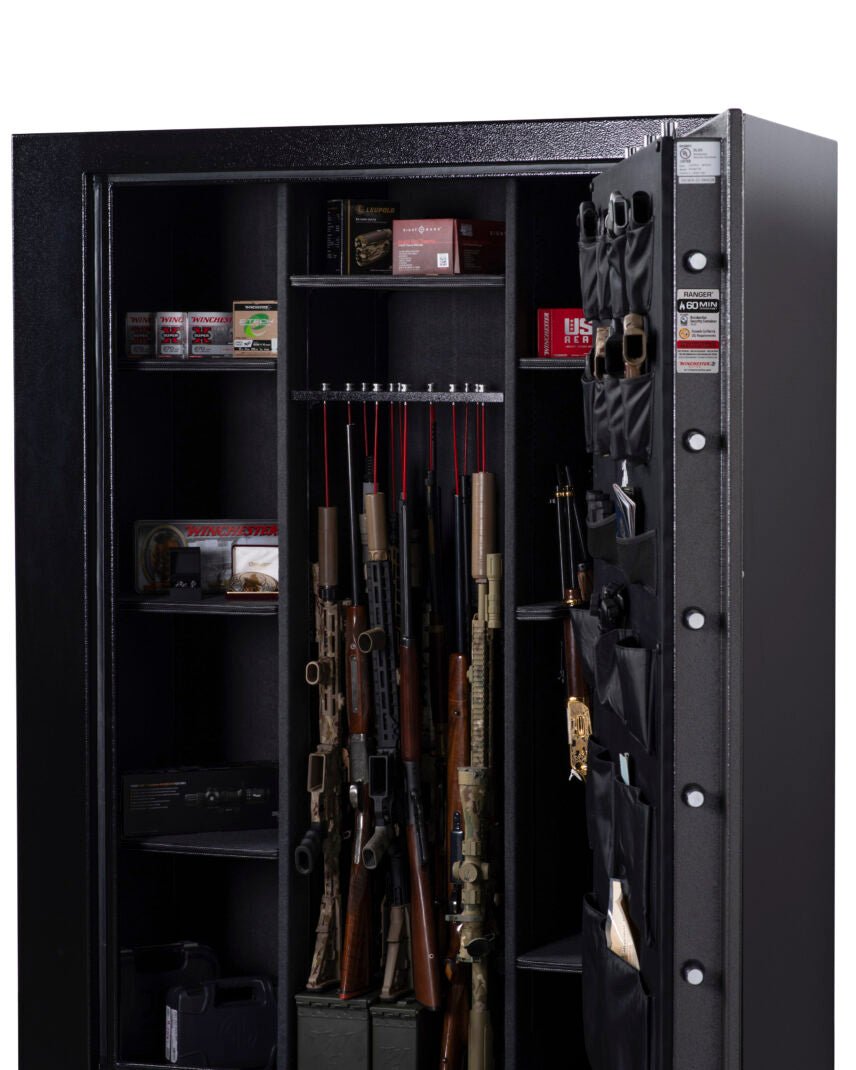Winchester Ranger 66 loaded with rifles and shotguns in GunStiXX storage, ammo boxes on shelves, and stocked door organizer