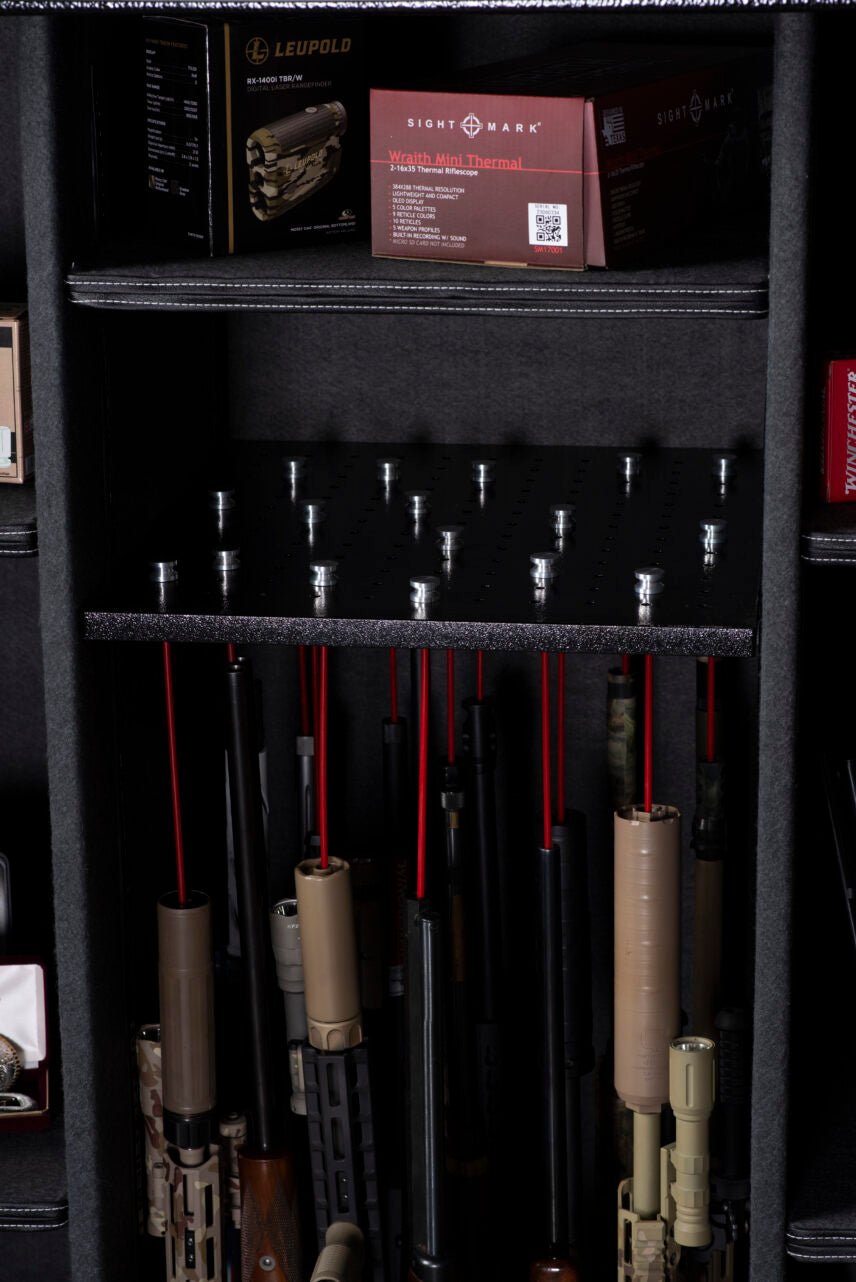 Extreme close-up of the Winchester Ranger 66 GunStiXX rack with Leupold and Sightmark optics boxes on the adjacent shelf