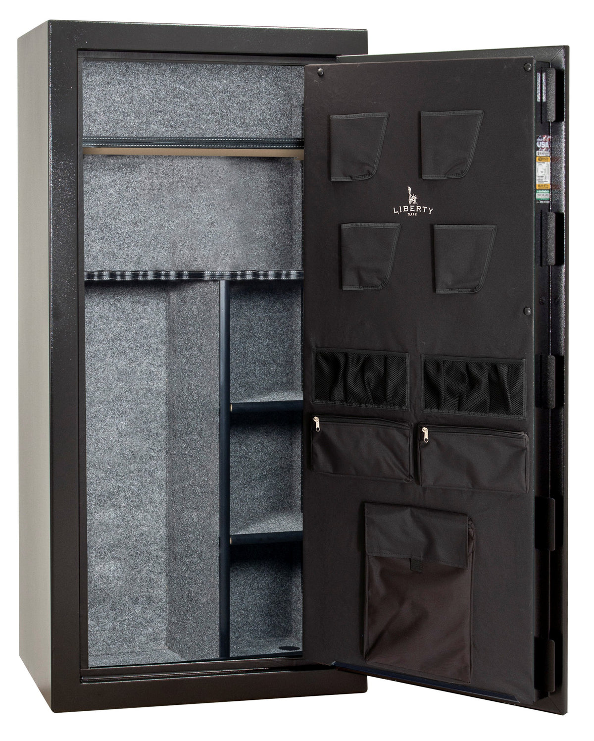 Liberty Safe Revere 30 gun safe with door open showing empty gray fabric interior, adjustable shelving, rifle racking with center divider, and Liberty-branded canvas door panel with four pistol pockets and document storage