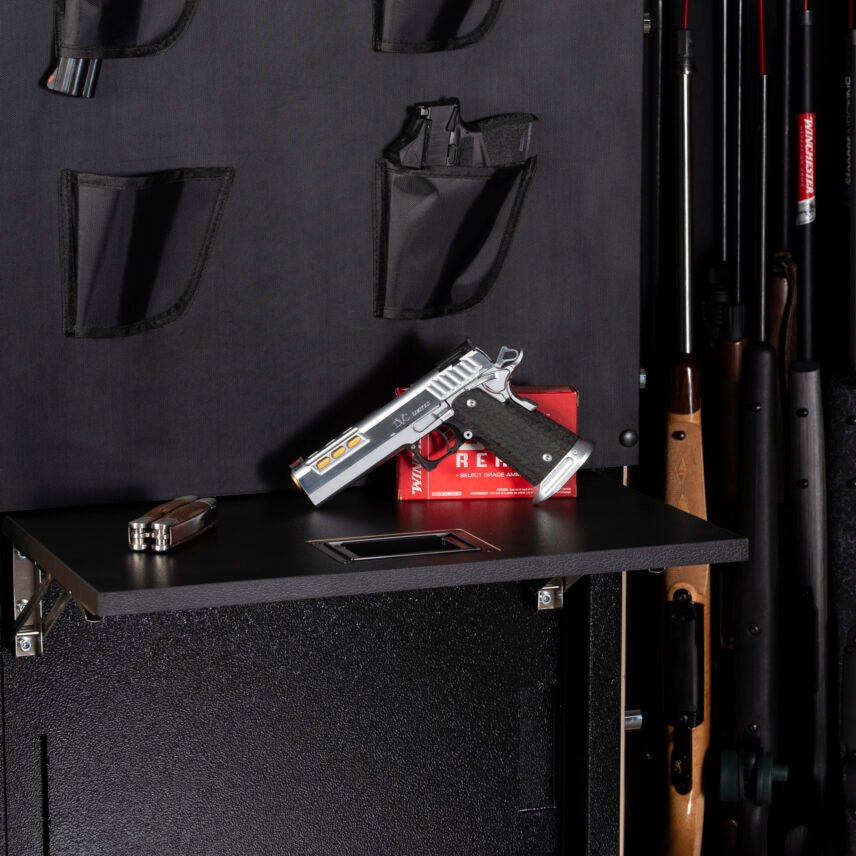 Close-up of the Winchester Grand American retractable Utility Shelf extended with a stainless pistol and Remington ammo box