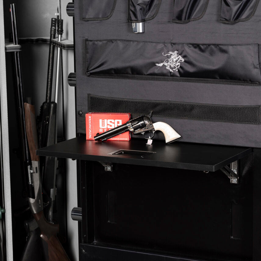 Close-up of the Winchester Legacy 53 Utility Shelf with a Winchester ammo box and single-action revolver on the shelf