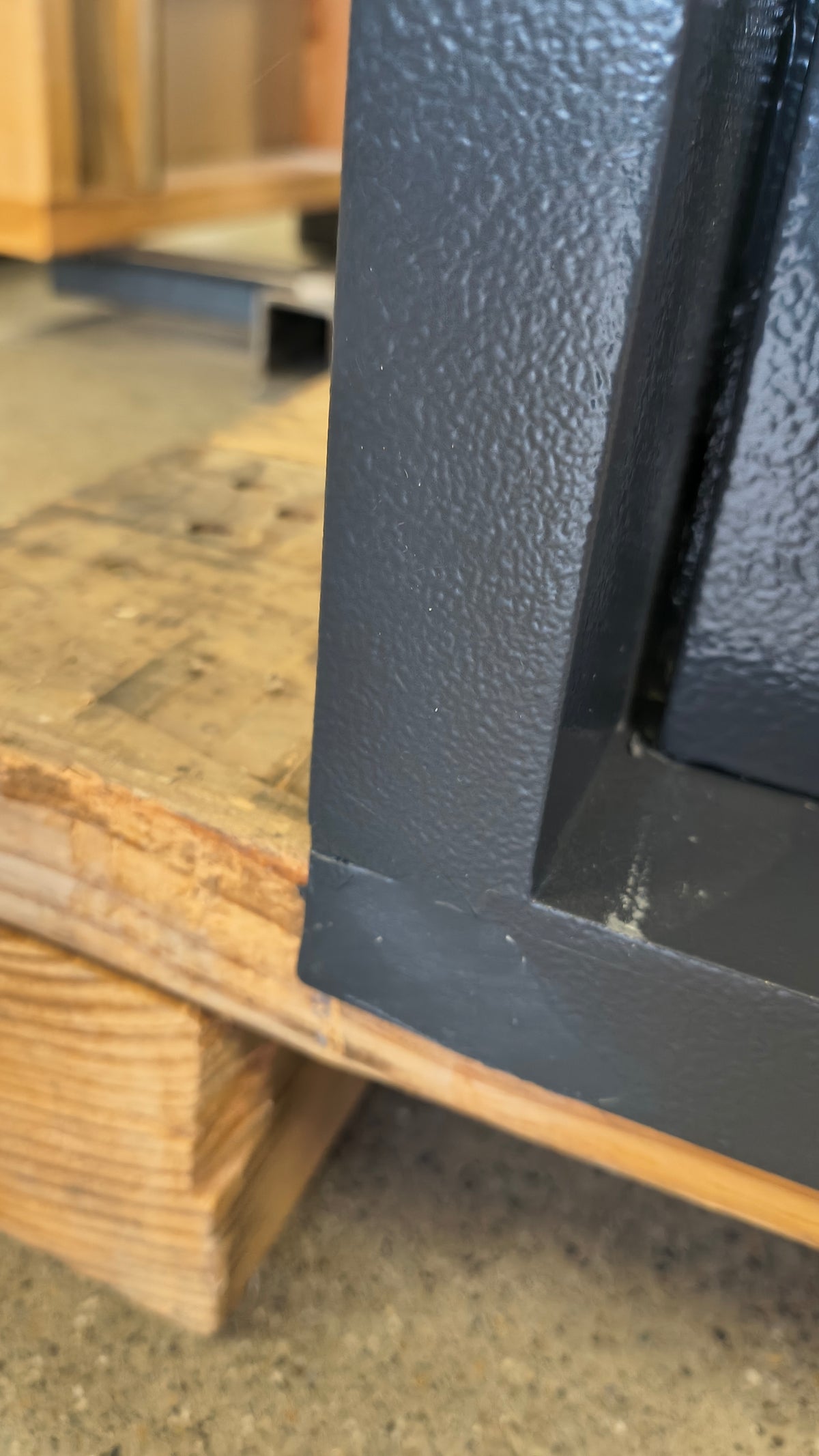 Blemished AMSEC WS1214E5 blemish on bottom left corner of flange with touch up paint applied. 