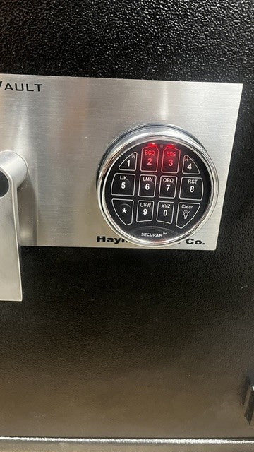 View of the digital lock, it has top lit lights. 