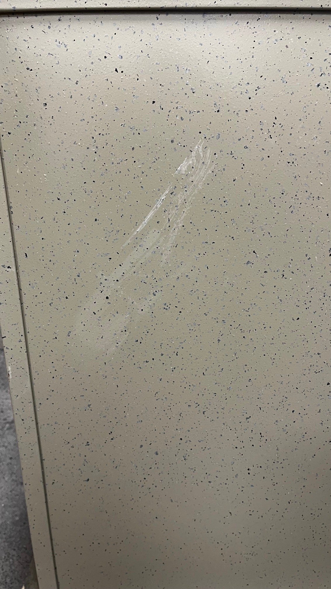 Close-up of the scratches on the back of the safe.  