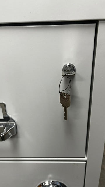 View of the Medeco key lock on the very top drawer. 