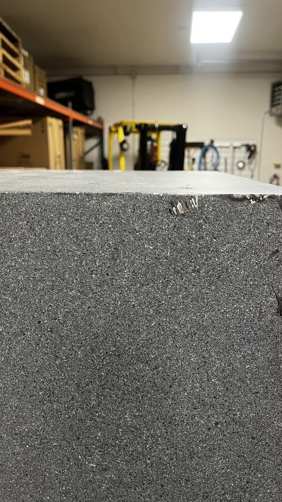 Close-up view of the scratches on the top right corner on the left side of the safe.
