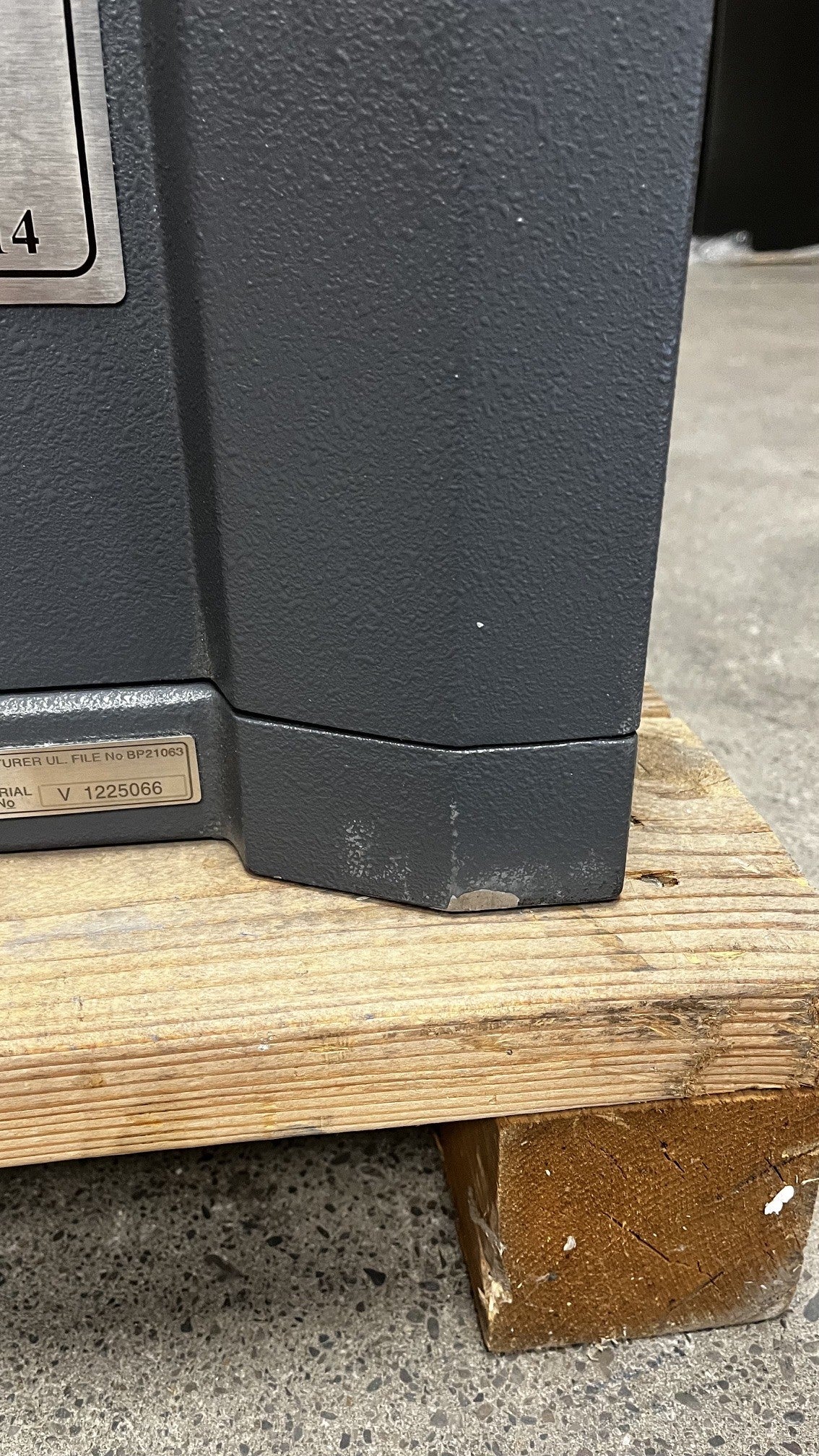 Close-up view of the paint chip on the lower right side of the safe. 