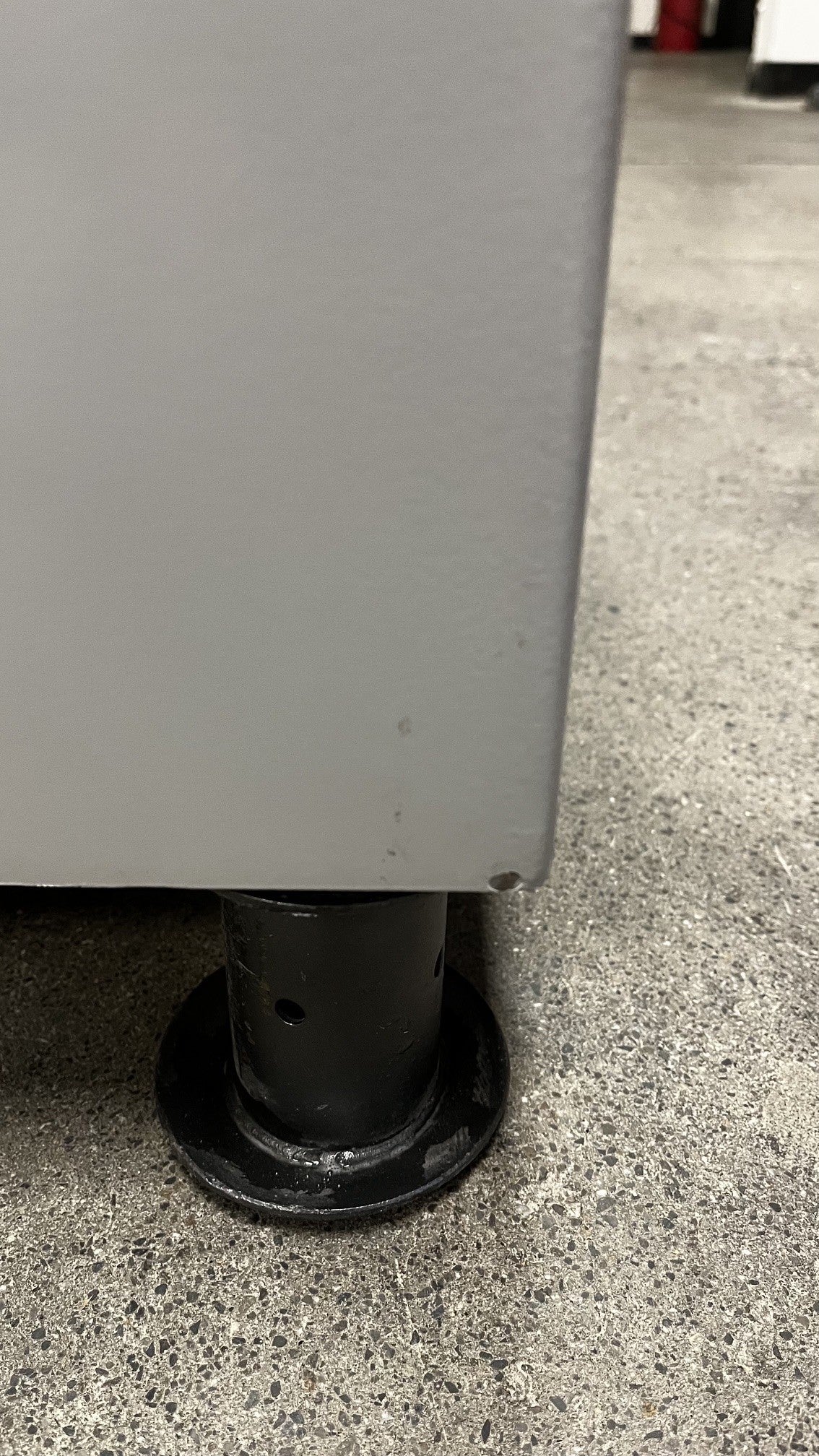 Lower back right corner has a small chip on the paint. 