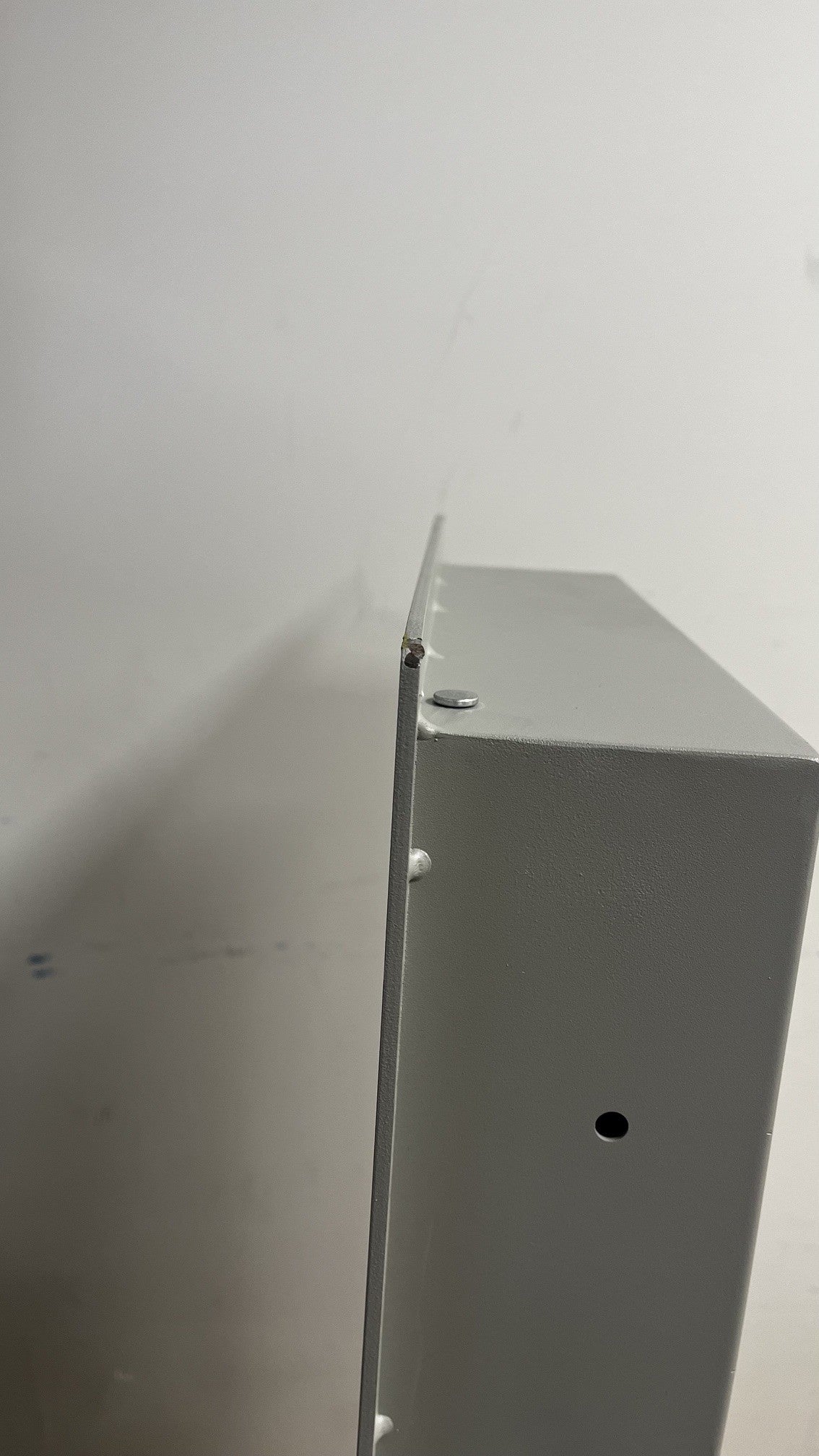 The top right corner on the flange has a small chip on the paint. 