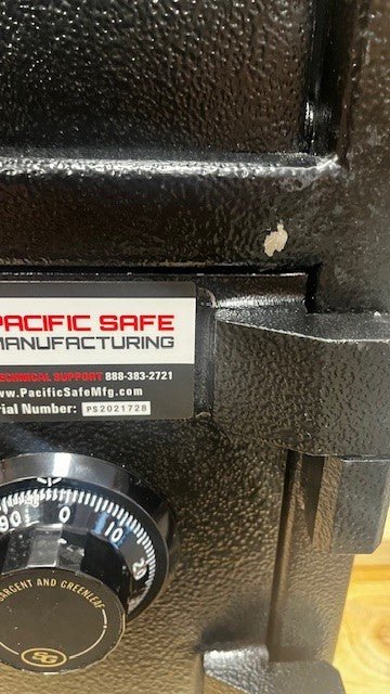 Close-up of the damaged paint near the top hinge. 