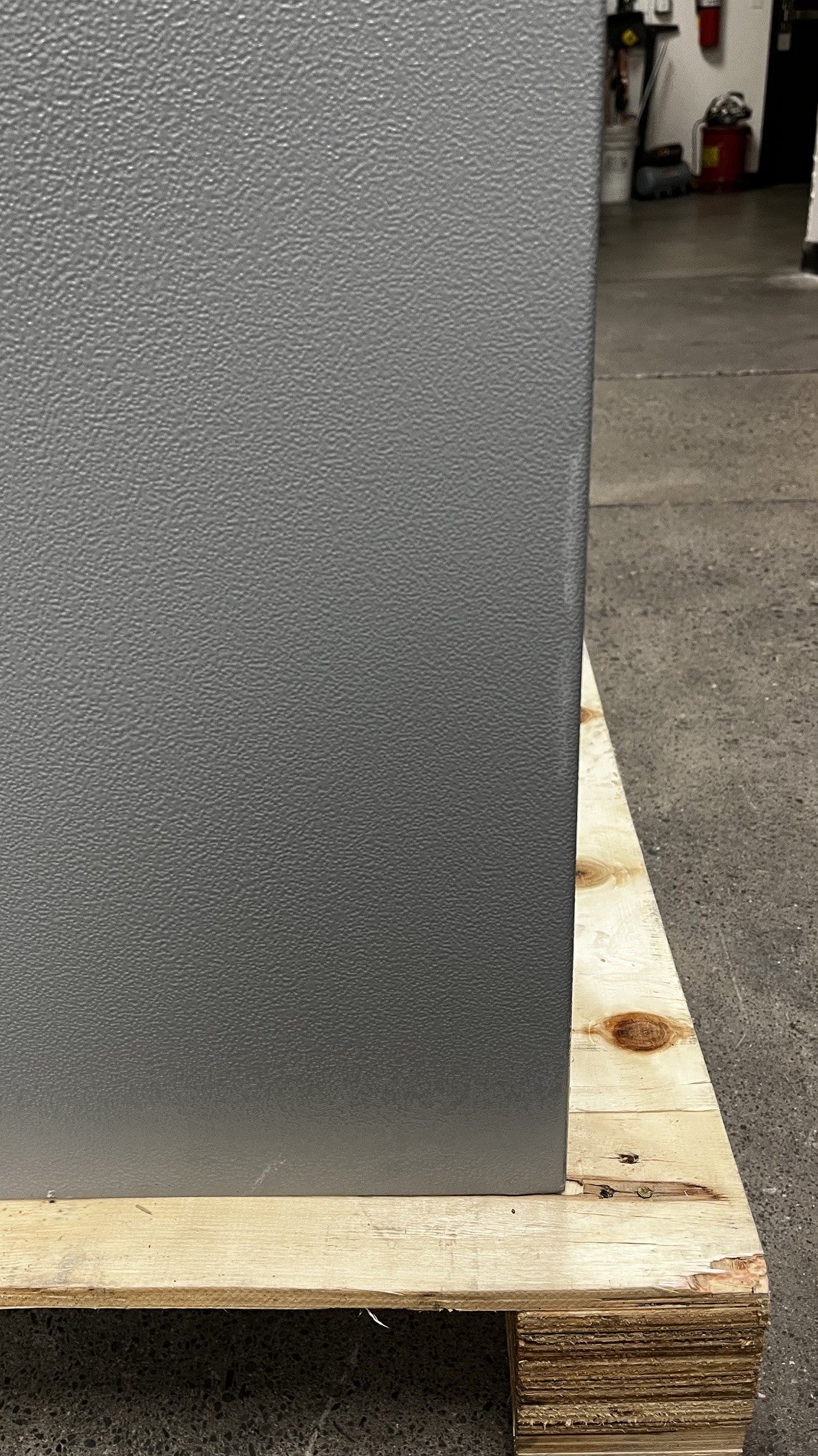 Small scratch on the bottom right edge of the safe. 