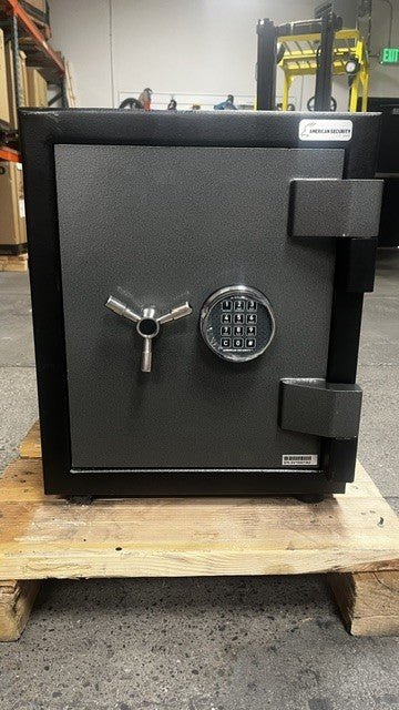 Front view of the safe, the safe comes with a digital lock ESL10. The top left corner has a blemished. It has been fixed and painted black to match the color of the safe.