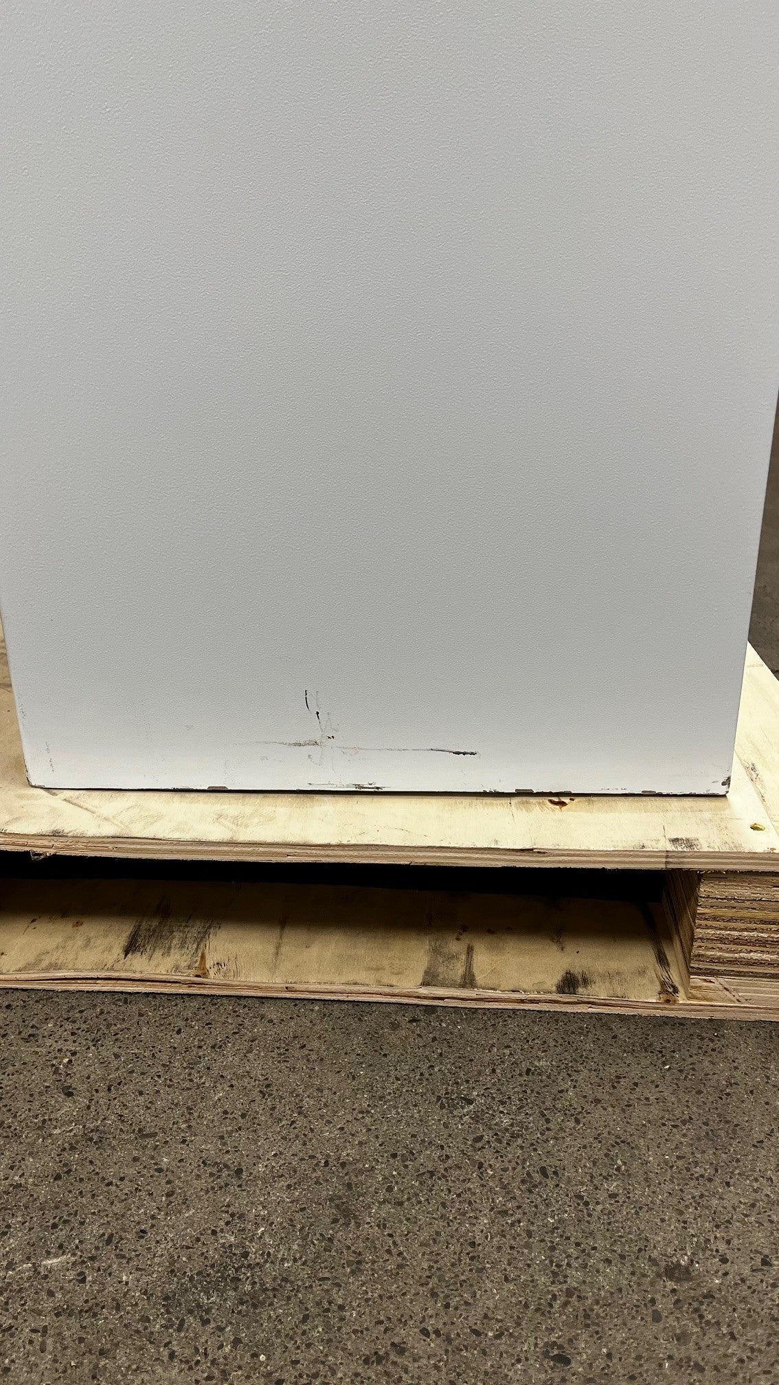 Close-up view of the few scratches on the bottom of the safe. 