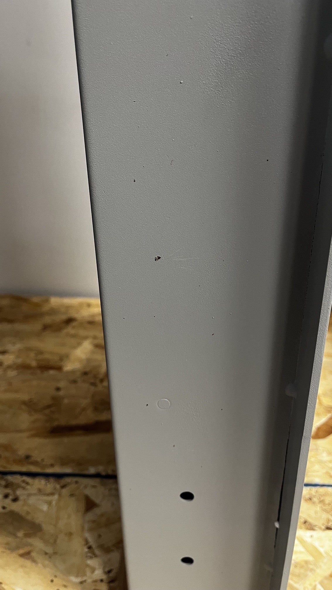 Small chips on the right side of the safe. 