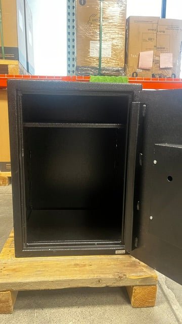 View of the inside of the safe, the safe does come with two adjustable shelves. The picture shows one, the other one is on the bottom of the safe. The safe also has 4 predrilled holes to bolt the safe down to the floor. 
