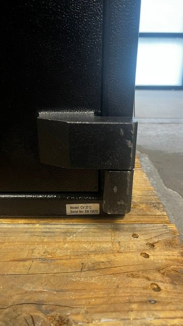 The lower front right hinge has a few chips on the paint. 