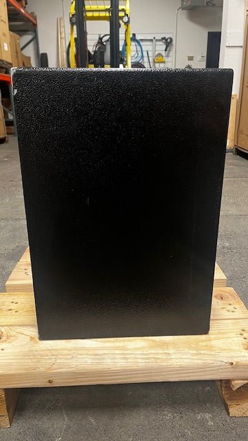 Left side view of the safe, the top left corner has some paint damage. 