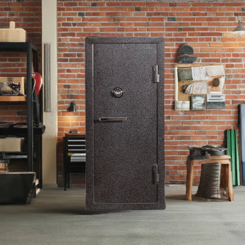Sturdy Safe Model 2822 Gun Safe 60"Hx28"Wx22"D Heavy Steel Construction In a room with brick wall in the background