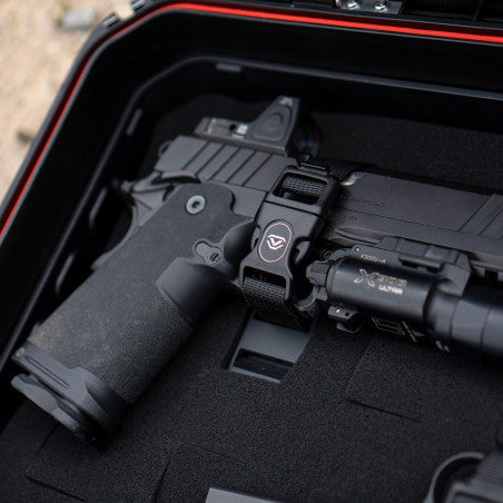 Vaultek XE-SK Range Kit quick-release strap securing a tactical handgun with weapon light inside a LifePod XE