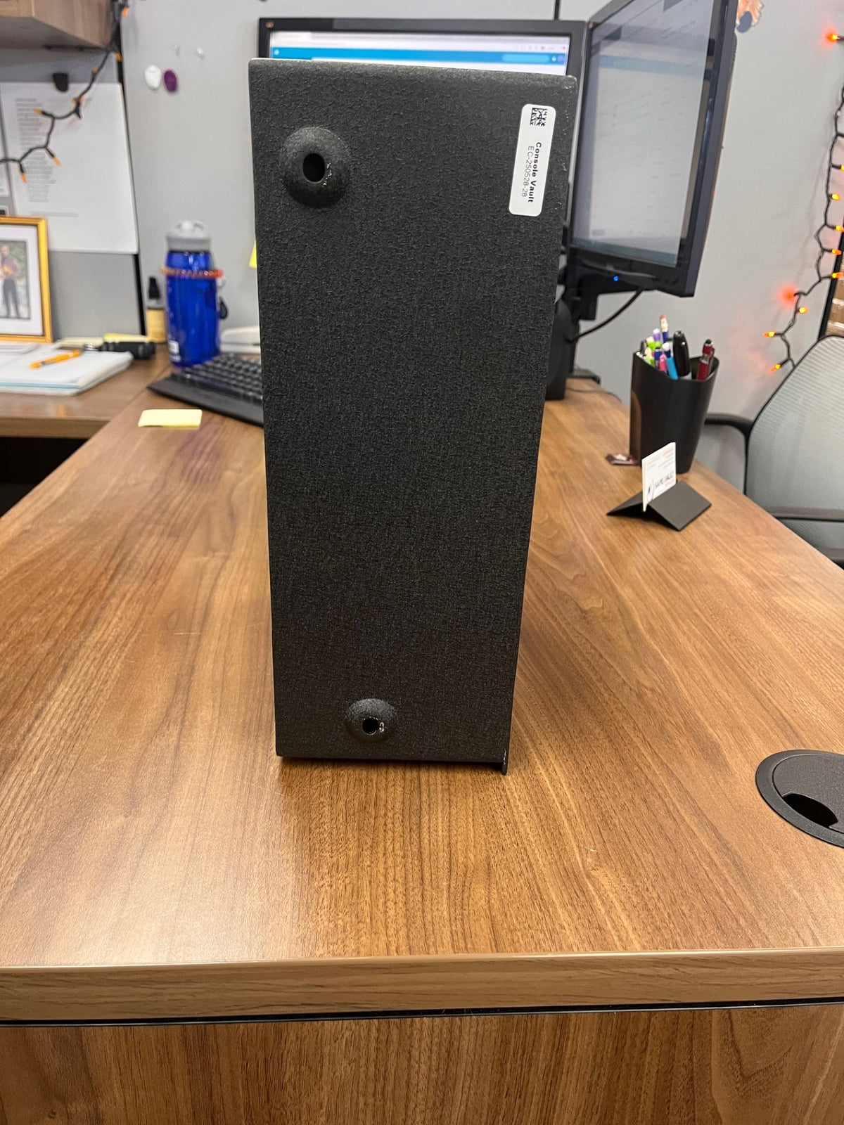 Back view of the safe. It has a very small paint marks around the bolt holes. 