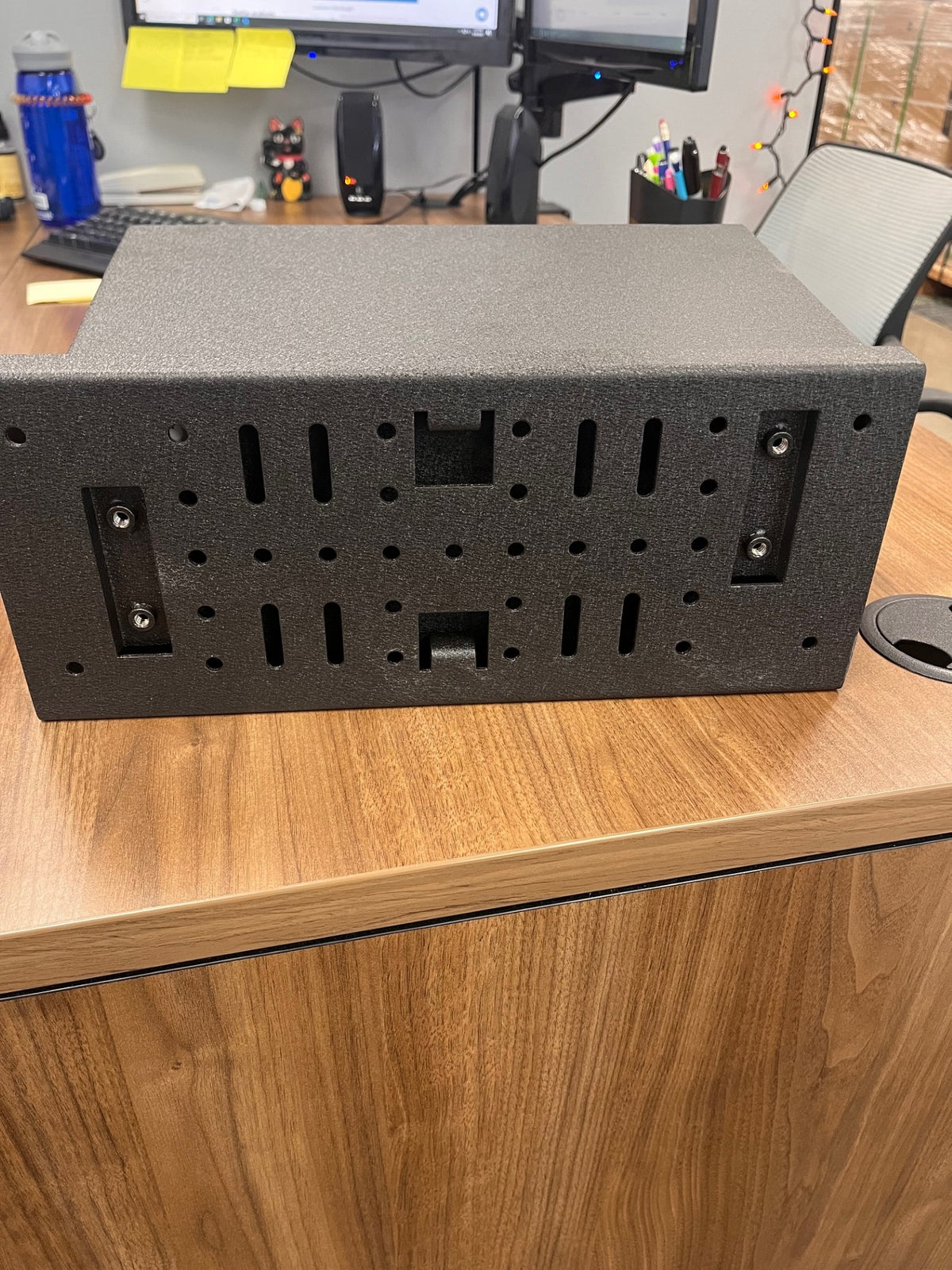 Back view off universal shelf with the safe on it. 