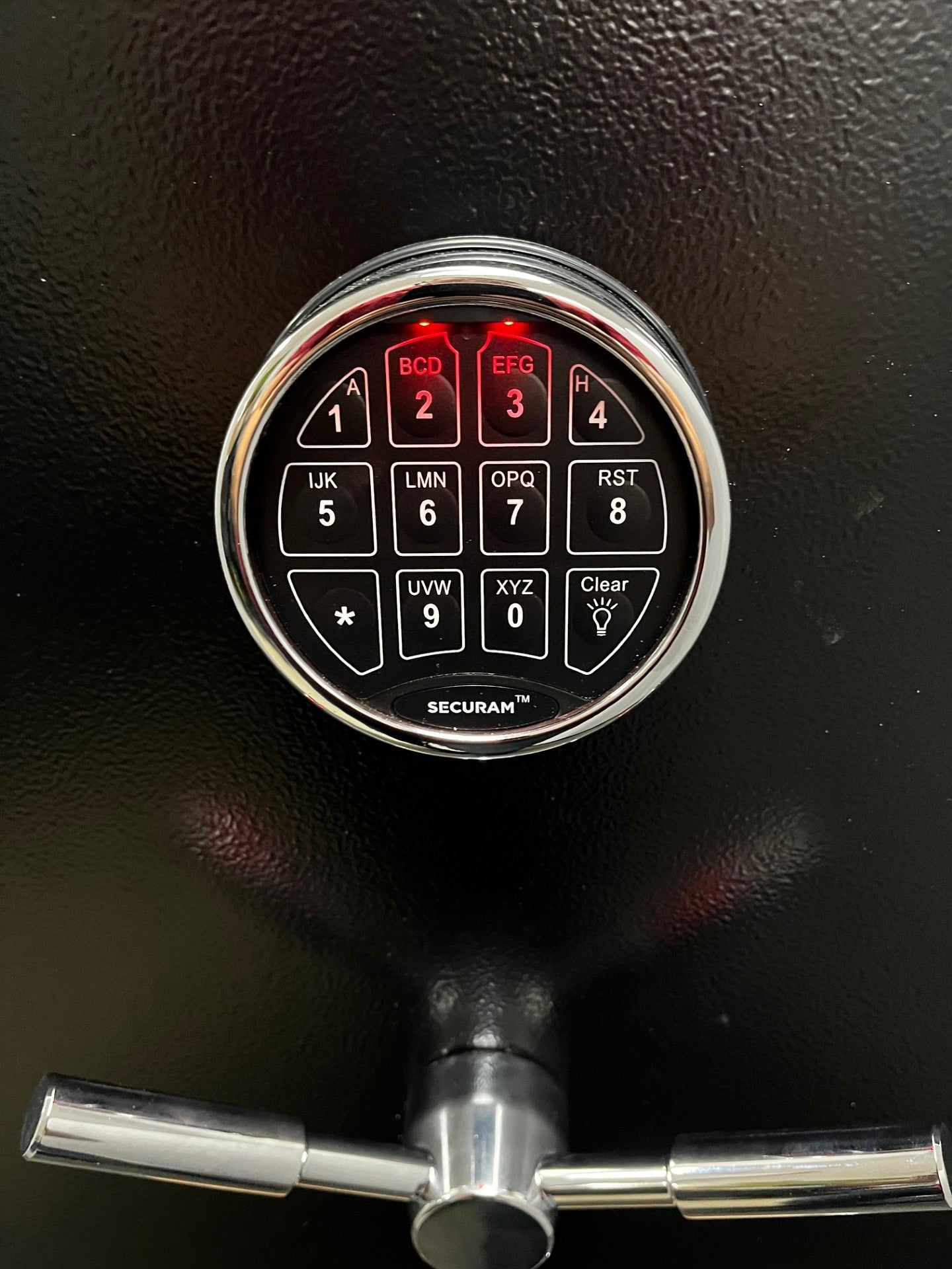 Front view of the safe. It comes with an electronical keypad. 