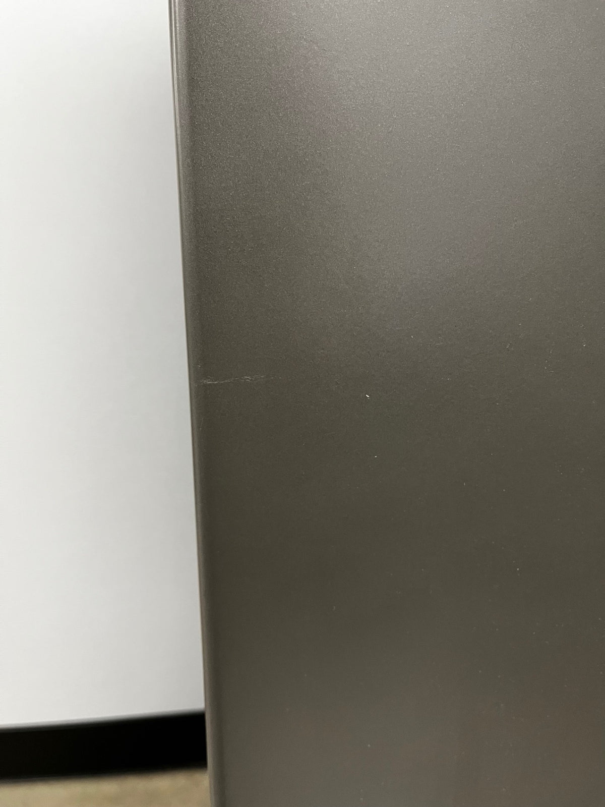 Small scratch on the bottom right side of the safe.