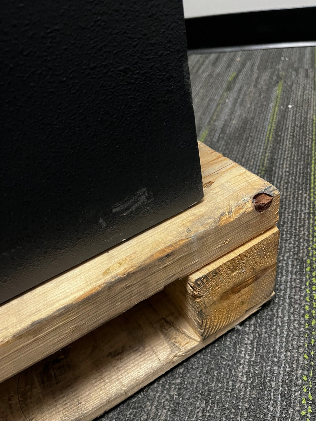 Close-up of the lower back with a scratch on it. 