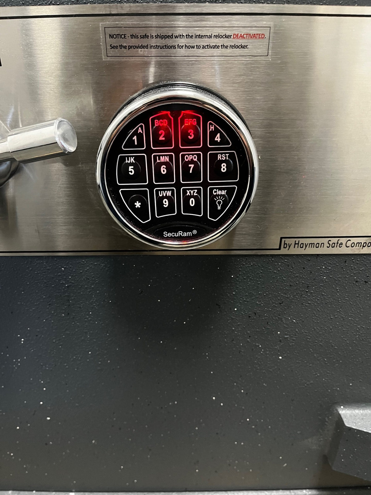 Close-up view of the digital keypad. The keypad is a top-lit keypad. 