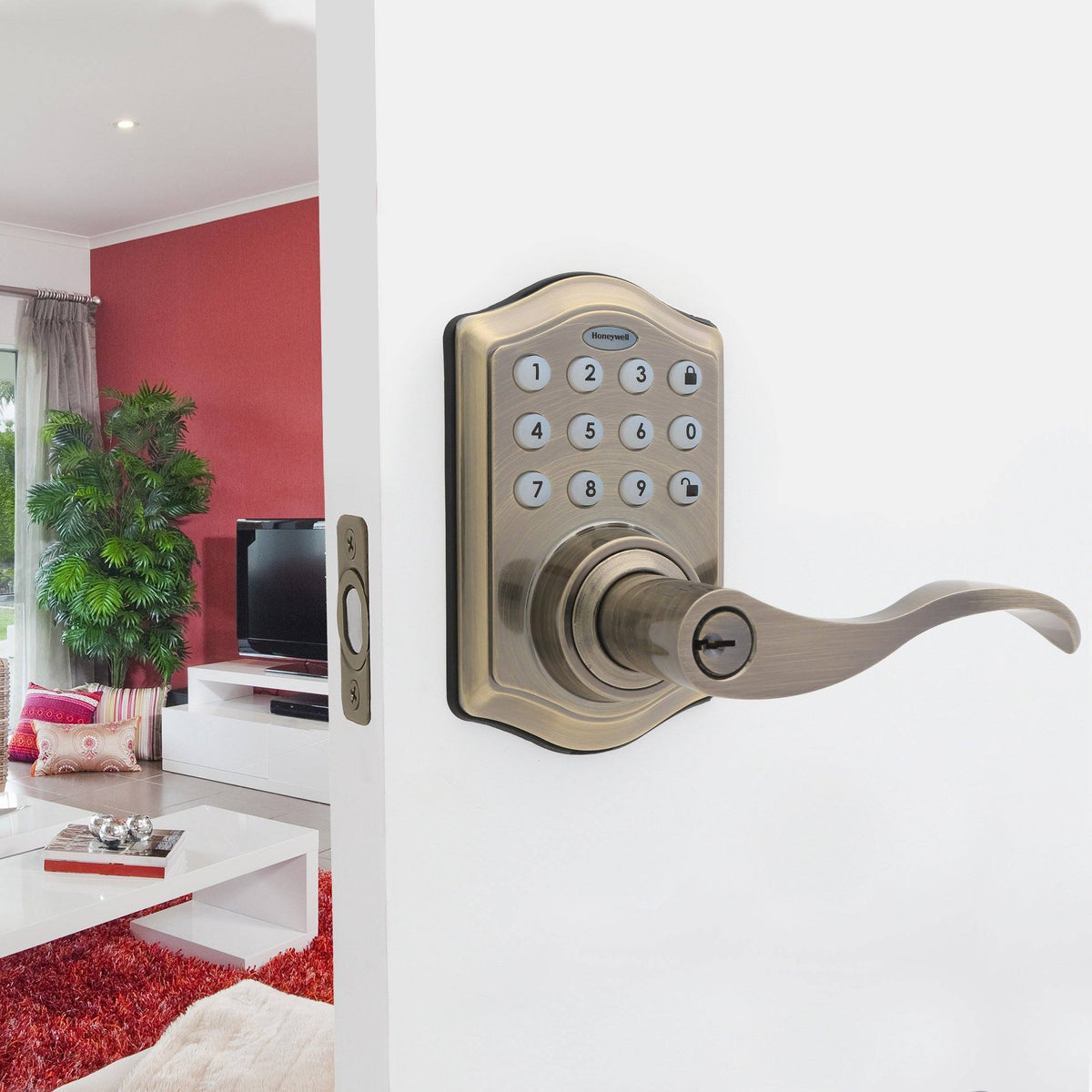 Honeywell 8734101 Electronic Entry Lever Door Lock with Keypad in Antique Brass Installed on Door