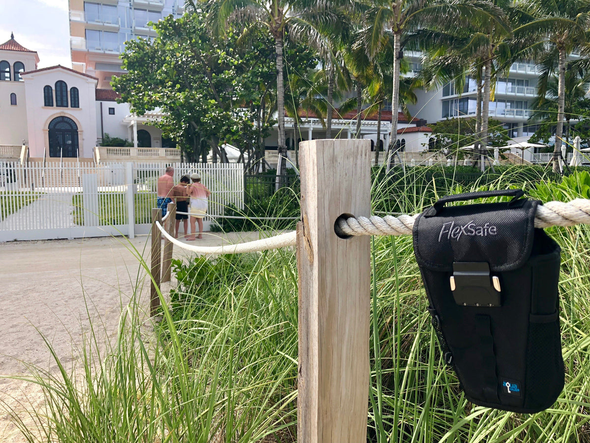 The Portable Travel Safe On Rope Grass and Palm Trees in background