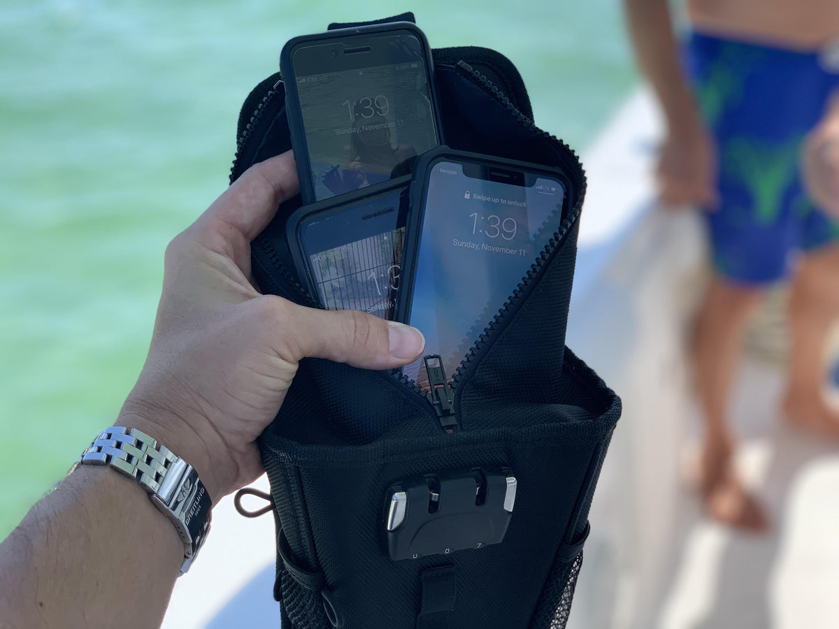 The Portable Travel Safe Open with Cell Phones Showing