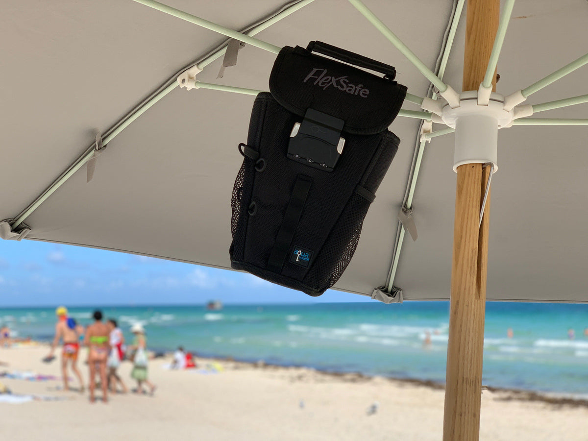 The Portable Travel Safe On White Umbrella with Beach in background