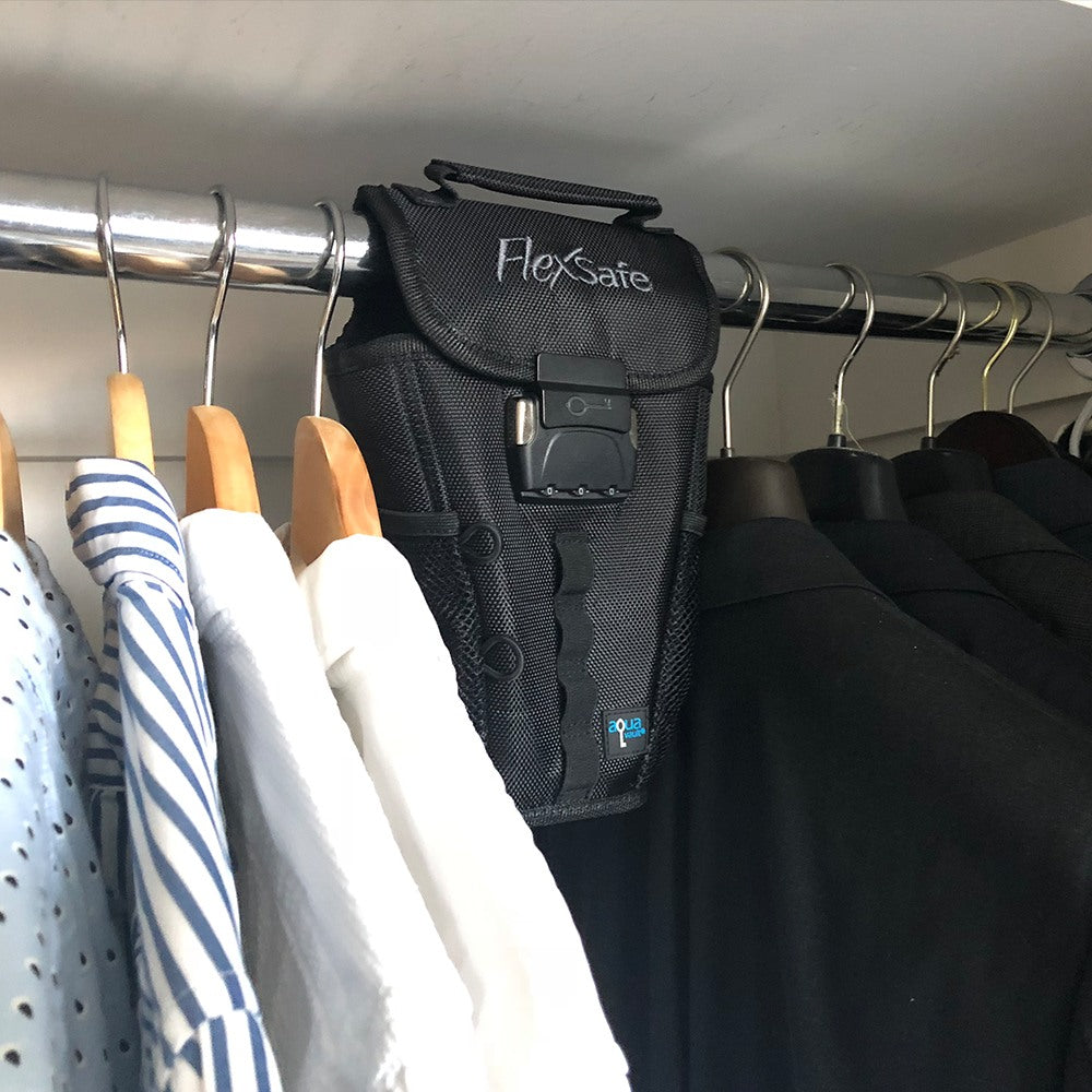 The Portable Travel Safe In Closet Next to Clothes