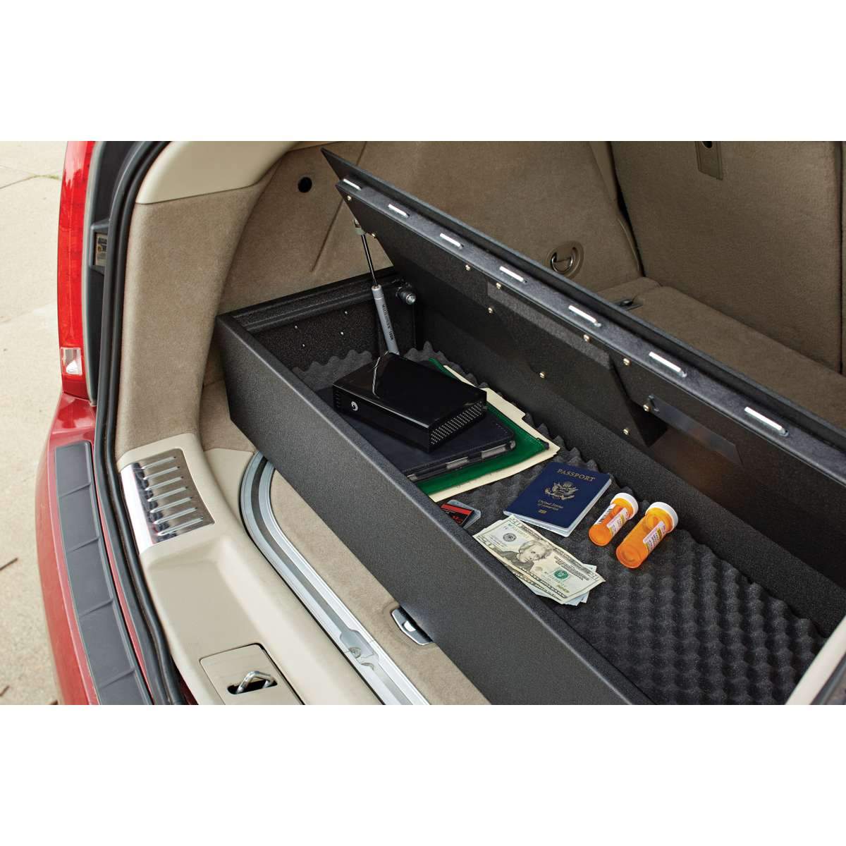 SnapSafe 75406 Trunk Safe II in back of vehicle open with contents